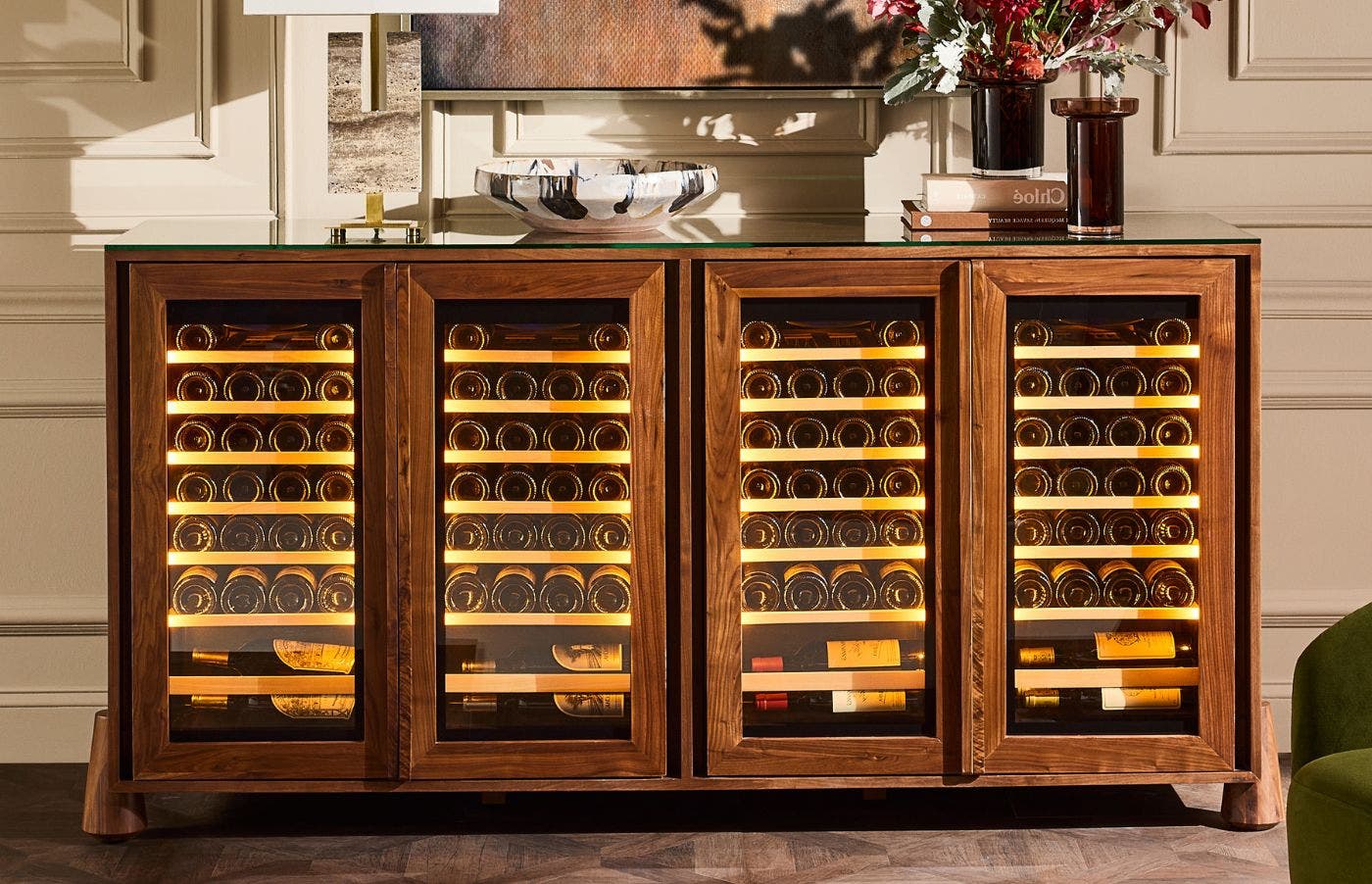 Walnut wine cabinet with four glass-fronted storage compartments